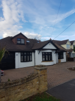 After picture of onsite uPVC coating of windows, doors and garage in Upminster, Essex. Coated in specialist uPVC paint RAL 9011.