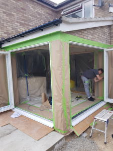 Before picture of uPVC coated in bi-fold onsite in Colchester, Essex.