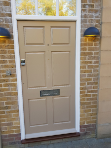 Front door coated onsite in Colchester, Essex, using specialist uPVC paint RAL 1019.