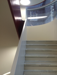 Onsite coating of bespoke staircase at Brighton, College, East Sussex.