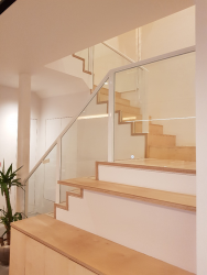 Onsite coating in London of damaged handrail in RAL 9010.
