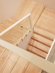 Onsite coating in London of damaged handrail in RAL 9010.