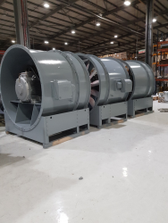 Extract fans awaiting dispatch coated in epoxy spread of flame and toxicity system RAL 7001.
