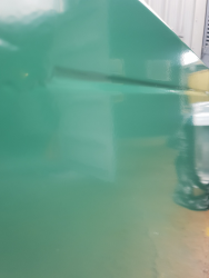 Powder coated silencer unit showing water droplets. Colour BS 14 C 39.