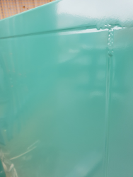 Powder coated silencer unit showing water droplets. Colour BS 14 C 39.