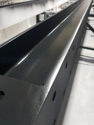 Steel work sprayed in our Colchester factory, using intrumesent system RAL 9011.