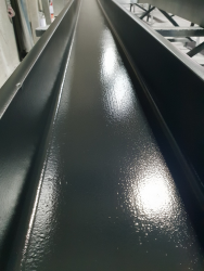 Steel work sprayed in our Colchester factory, using intrumesent system RAL 9011.