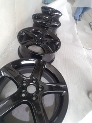 Wheels powder coated in gloss black.