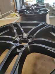 Wheels powder coated in gloss black.